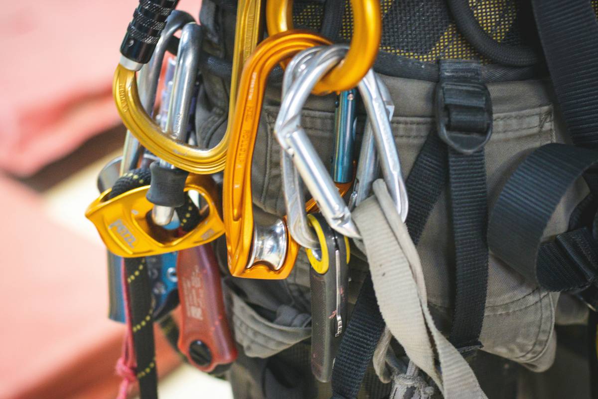 Side-by-side comparison of aluminum vs. steel tricam bodies and polymer stems showing wear patterns after desert climbing