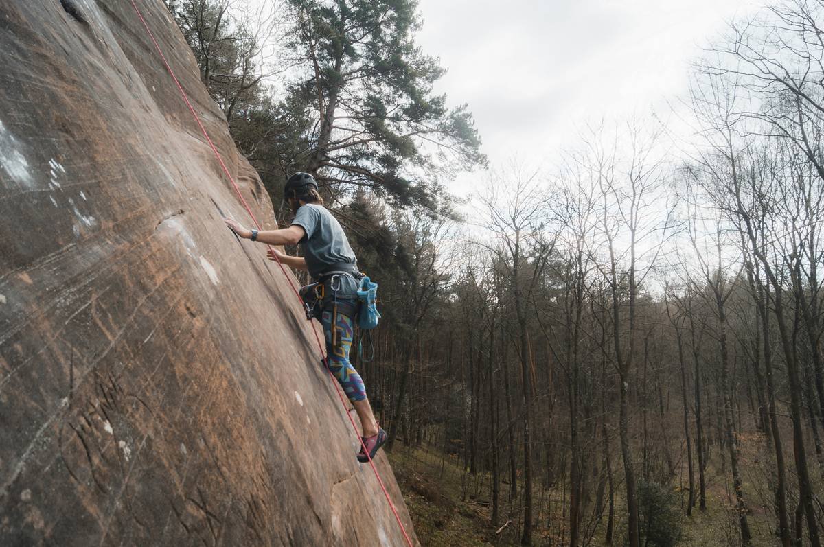 Black Diamond Tricam #1 placed in flared gritstone crack at Stanage Edge, showing webbing sling and stem orientation