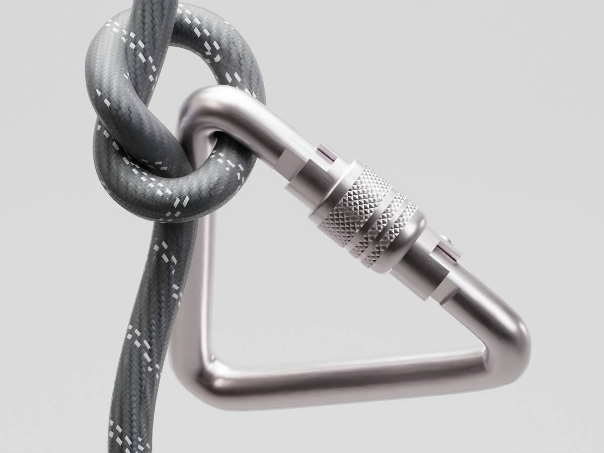 Diagram showing Tricam failure points: 87% sling wear, 9% pivot pin corrosion, 4% aluminum deformation